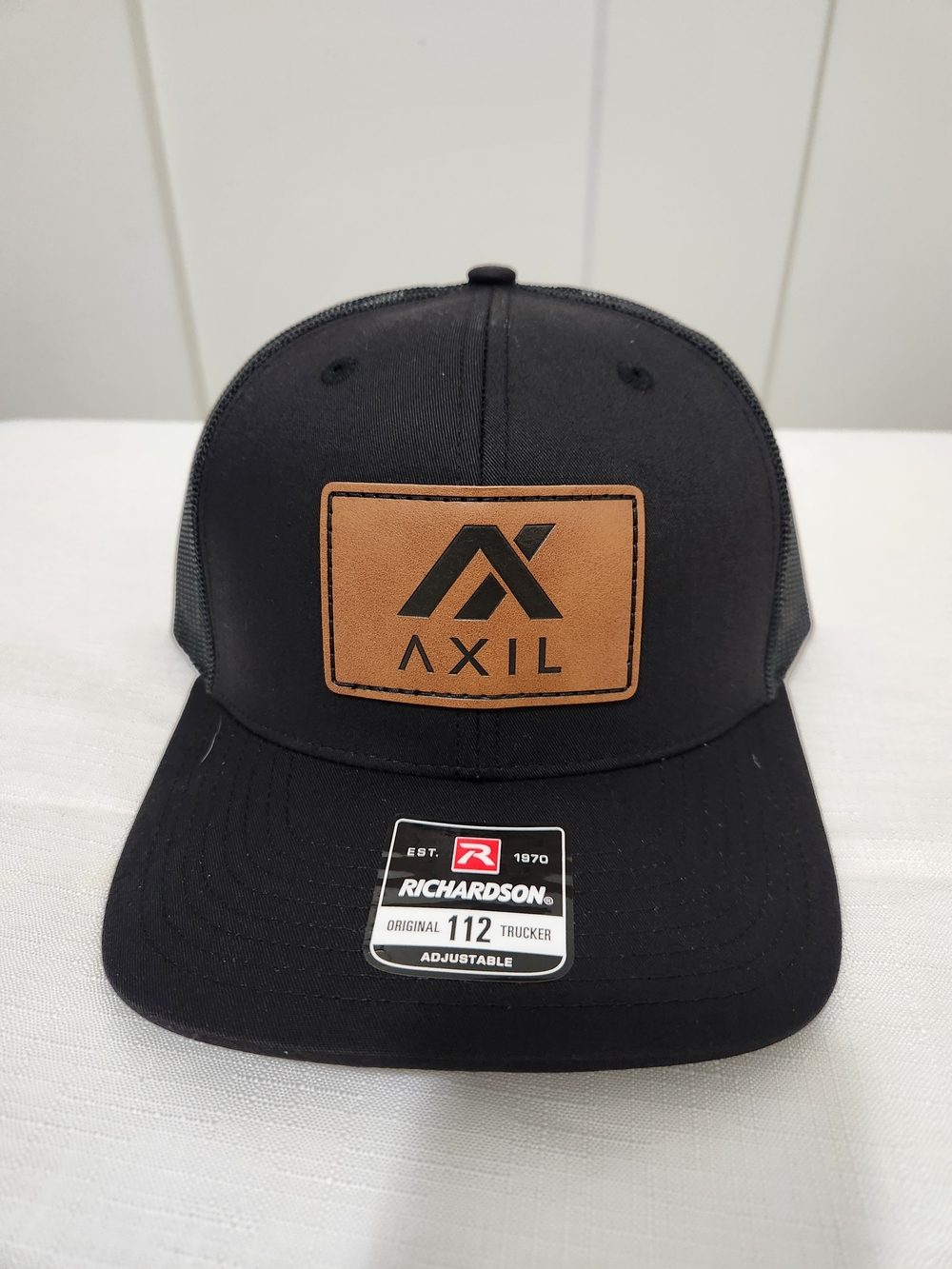 AXIL Black Trucker Hat